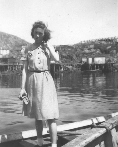 313: Anne McCarthy standing in a dory. (1939)  - daughter of James McCarthy &amp;amp; Julia Reddy